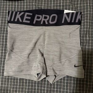 Nike Pro Women's Light Gray Bike Shorts with Black Waistband